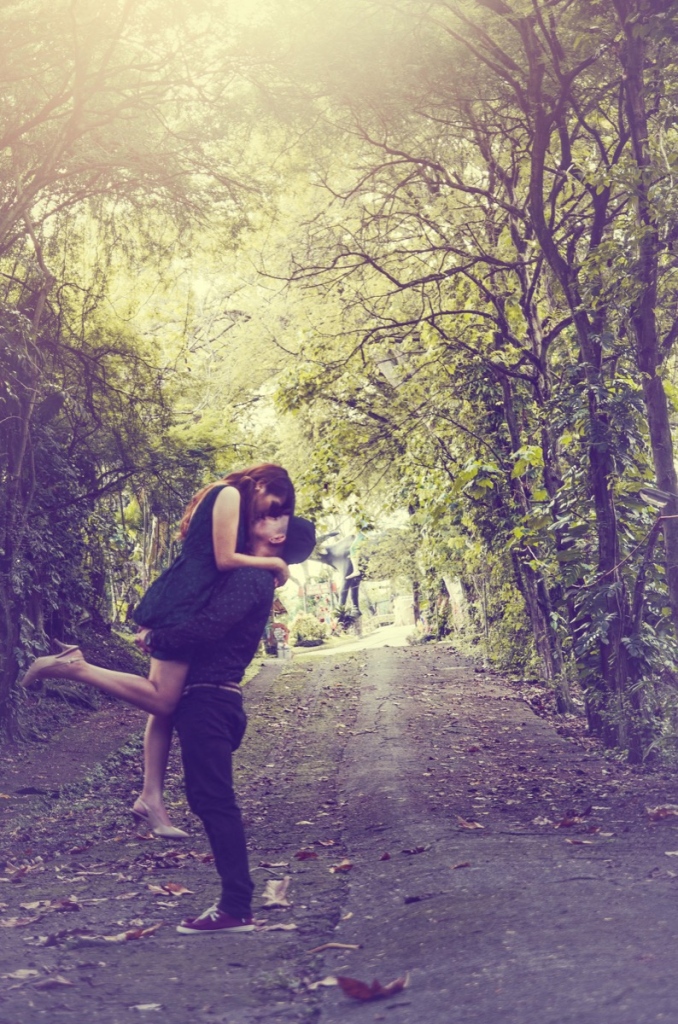 I asked the guy to lift up the girl, but they candidly kissed after hearing the shutter click.