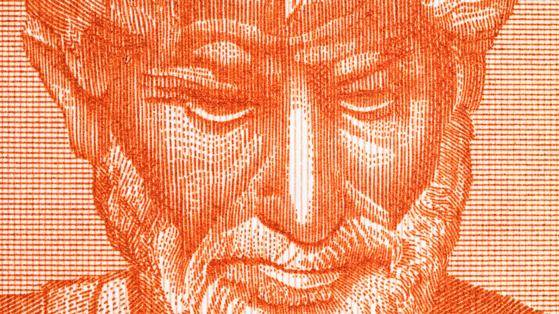 A close-up of a reddish-orange engraving shows an elderly man with a beard and focused expression, as though he's reflecting on the wisdom found in books.