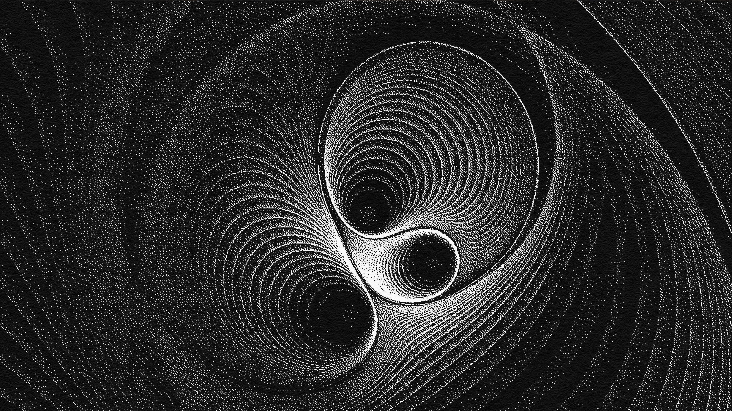 Black and white abstract design featuring swirling, concentric patterns resembling a ripple effect with a yin-yang-like motif at the center.